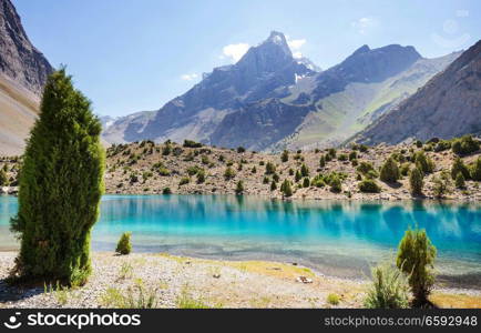 Beautiful serene lake in  Fanns mountains (branch of Pamir) in Tajikistan.