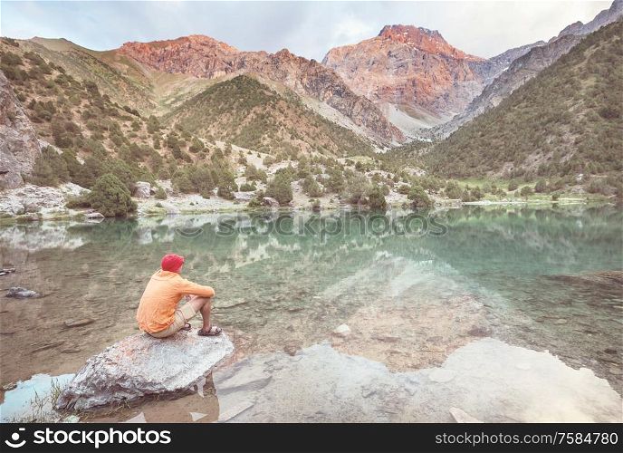 Beautiful serene lake in Fanns mountains (branch of Pamir) in Tajikistan.