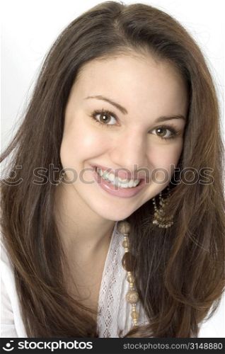 Beautiful seventeen year old girl. Great smile and bright eyes. Shot in studio.