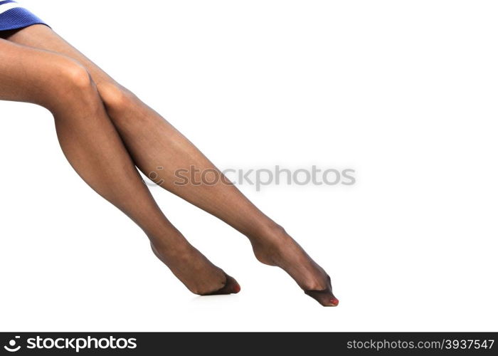 Beautiful sexy long woman legs in nice black pantyhose isolated on white background