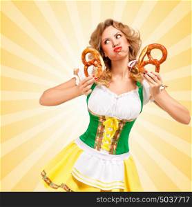 Beautiful sexy offended Oktoberfest woman wearing a traditional Bavarian dress dirndl holding two pretzels, puffing her cheeks and pouting on colorful abstract cartoon style background.