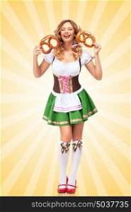 Beautiful sexy Oktoberfest woman wearing a traditional Bavarian dress dirndl laughing happily and holding two pretzels in hands on colorful abstract cartoon style background.