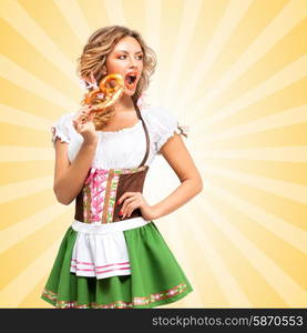 Beautiful sexy Oktoberfest woman wearing a traditional Bavarian dress dirndl with open mouth eating a pretzel on colorful abstract cartoon style background.