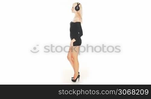 beautiful sexy woman dancing in black dress
