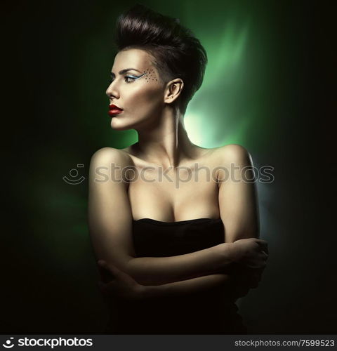 beautiful sexy woman with red lips in green light