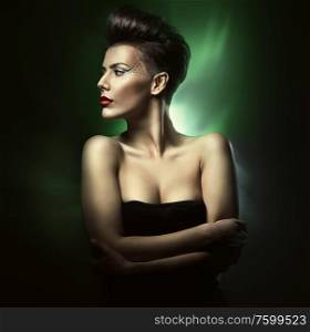 beautiful sexy woman with red lips in green light