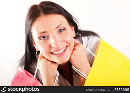 Beautiful shopping woman happy holding paper bags