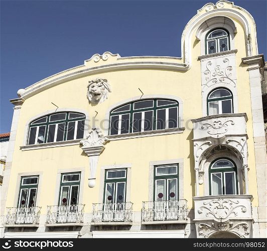 Beautiful showcase of art deco on a building facade in Portugal