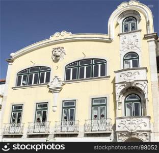 Beautiful showcase of art deco on a building facade in Portugal