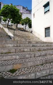 beautiful sidewalk view at Sao Miguel stairs in Alfama district in Lisbon, Portugal