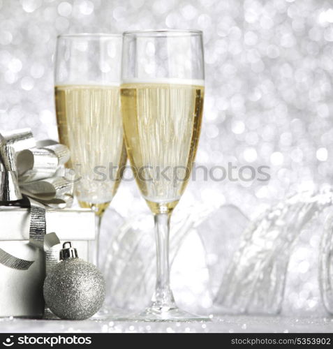 Beautiful silver christmas card with champagne and gift