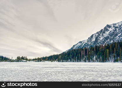 Beautiful sinset scenery of Popradske Pleso in High Tatras, Slovakia, Europe