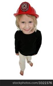 Beautiful six year old girl in toy dress up fire hat