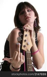 Beautiful Sixteen year old girl sitting with bass, shooting the finger towards camera.