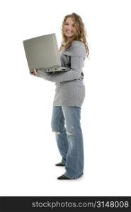 Beautiful Sixteen Year Old Teen Girl With Laptop Computer. Full body over white background.