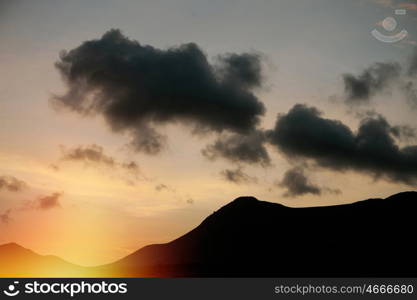 Beautiful sky in sunset with layers of the mountain.