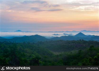 Beautiful sky sunrise asia landscape on hill with fog mist in the morning background
