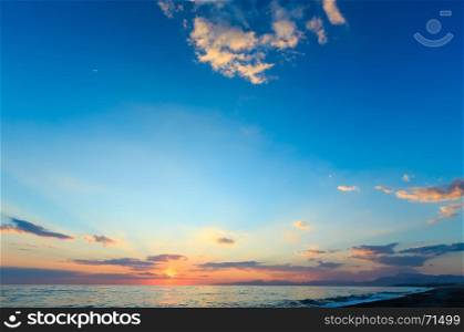 Beautiful skyscape with tropical sea sunset on the beach.