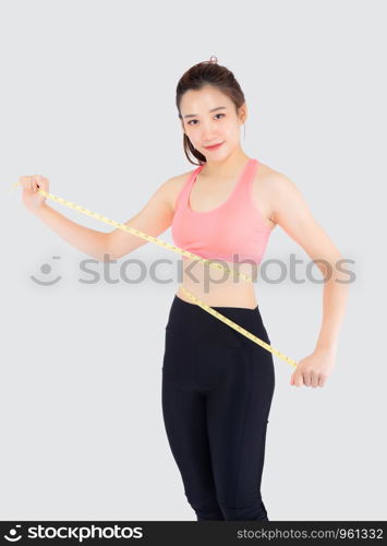 Beautiful slim young asian woman measuring tape thin waist wear uniform fitness isolated white background, asia girl loss weight for diet with exercise and workout wellbeing and healthy care body.