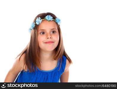 Beautiful small girl with blue dress and a flowersA? wreath on her head isolated on a white background