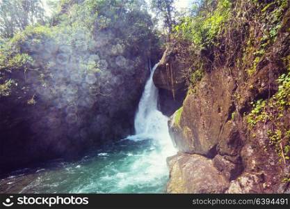 Beautiful small waterfall in green jungle, Costa Rica. Central America