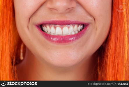 Beautiful smile of a redhead woman, she is caring her teeth