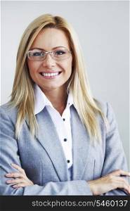 Beautiful smiling business woman in glasses