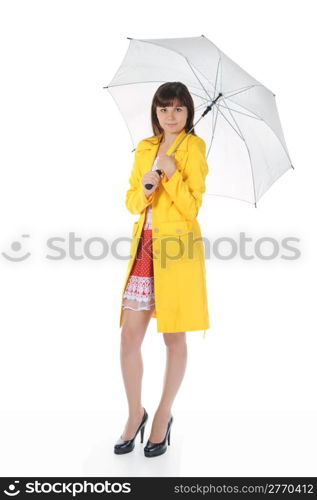 beautiful smiling girl in in a yellow raincoat with umbrella. Isolated on white background