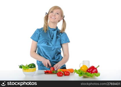 Beautiful smiling girl preparing breakfast at the kitchen table. Isolated on white background.