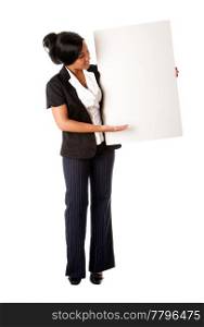 Beautiful smiling successful corporate business woman pitching an idea presenting blank whiteboard, isolated.