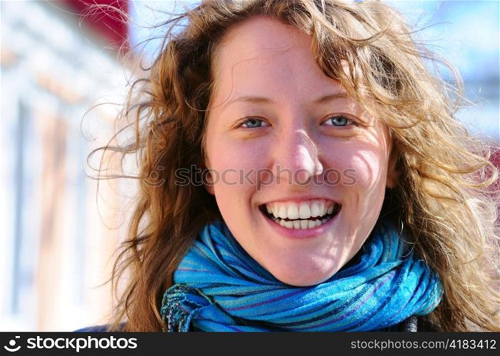 beautiful smiling woman is looking at camera