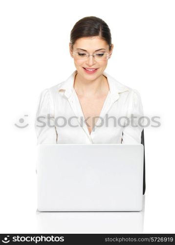 Beautiful smiling woman sits from th? table with laptop in white shirt - isolated on white. &#xA;