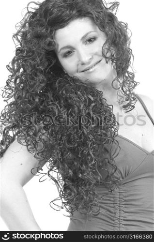 Beautiful smiling woman with red long curly wig