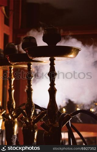 Beautiful smoke in the bowl of a hookah. close-up