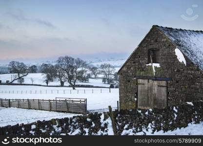 Beautiful snow covered sunrise Winter countryside landscape