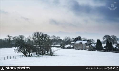 Beautiful snow covered Winter landscape at sunrise in Peak Distr. Landscapes. Snow covered Winter landscape at sunrise in Peak District in England