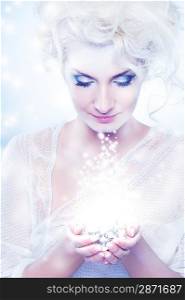 Beautiful snow queen with a christmas decoration