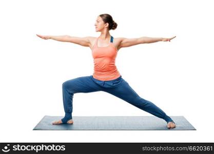 Beautiful sporty fit yogini woman practices yoga asana Virabhadrasana 2 - warrior pose 2 isolated on white. Woman practices yoga Warrior asana