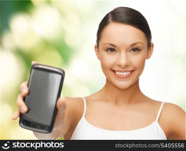 beautiful sporty woman showing smartphone with app