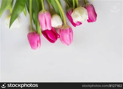 Beautiful spring bouquet with pink and white tulips on a white background. Spring, 8 March, birthday. Postcard, place for an inscription. Beautiful spring bouquet with pink and white tulips on a white background. Spring, 8 March, birthday. Postcard, place for an inscription.