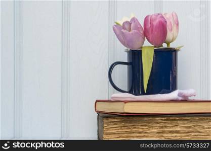 Beautiful Spring flower still life with wooden background