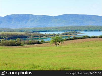 beautiful spring lake and and meadow in front (Crimea, Ukraine)