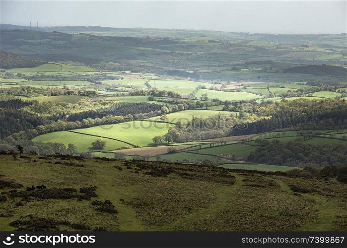 Beautiful Spring landscape image of view from Haytor in Dartmoor National Park in Devon England on lovely sunny Spring day