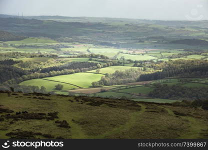 Beautiful Spring landscape image of view from Haytor in Dartmoor National Park in Devon England on lovely sunny Spring day