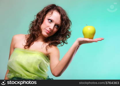 Beautiful spring woman with apple. Green or dieting concept. Healthy eating