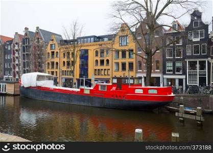 beautiful streets, bridges and channels in the famous city of amsterdam, netherlands