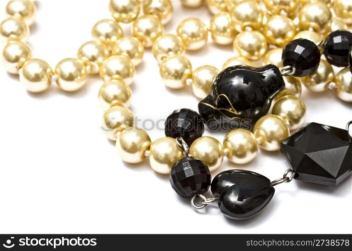 Beautiful string of beads isolated on black background