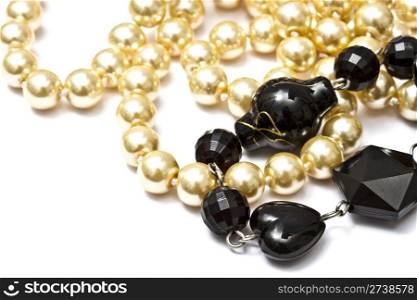 Beautiful string of beads isolated on black background