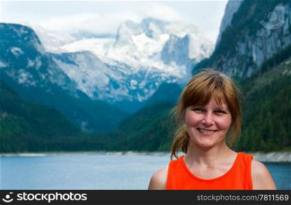 Beautiful summer Alpine lake Gosausee view (Austria) and woman portrait