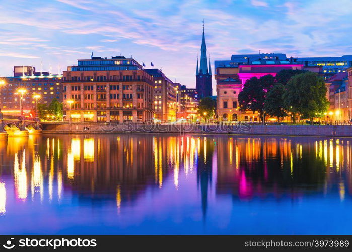 Beautiful summer evening scenery of sunset in the Old Town (Gamla Stan) architecture near the Vasa Bridge (Vasabron) in Stockholm, Sweden